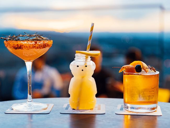 three drinks on the rooftop 